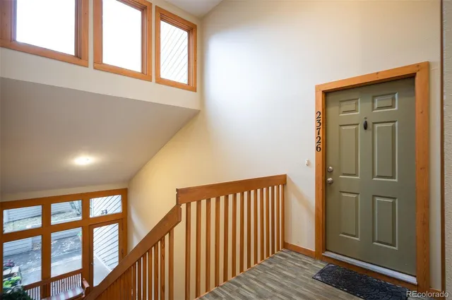 a view of balcony with furniture