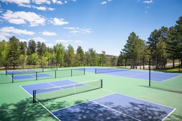 a view of a building with a yard