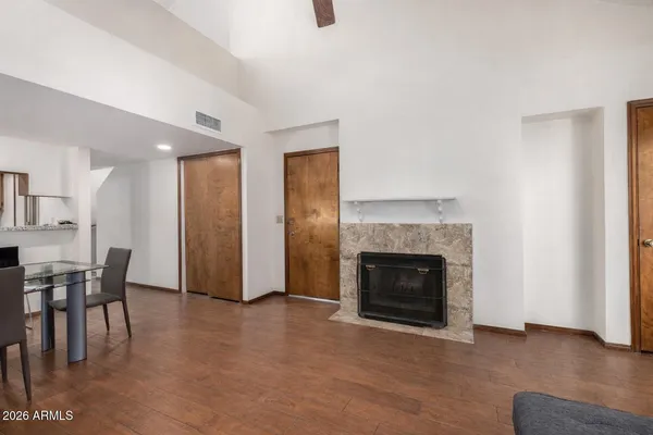 a view of a livingroom with furniture and a fireplace