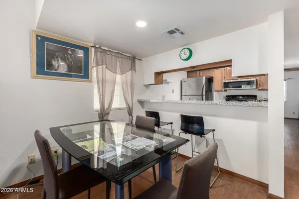 a view of a dining room with furniture