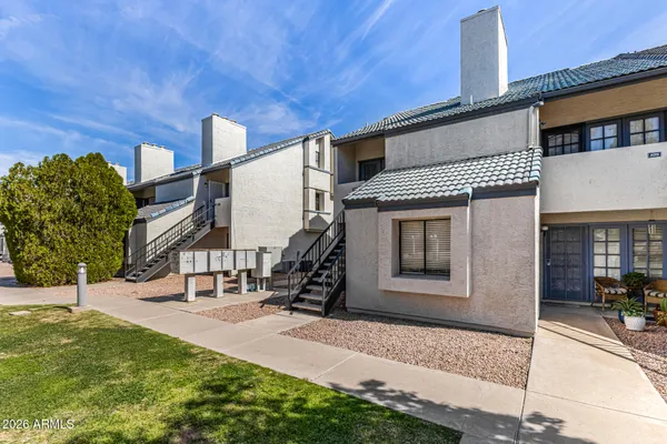 a house view with a outdoor space