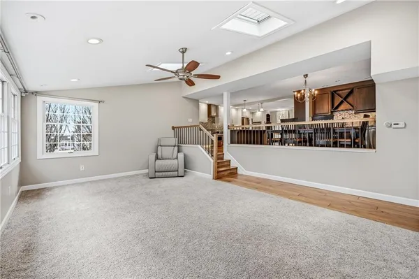 a view of livingroom with furniture and ceiling fan