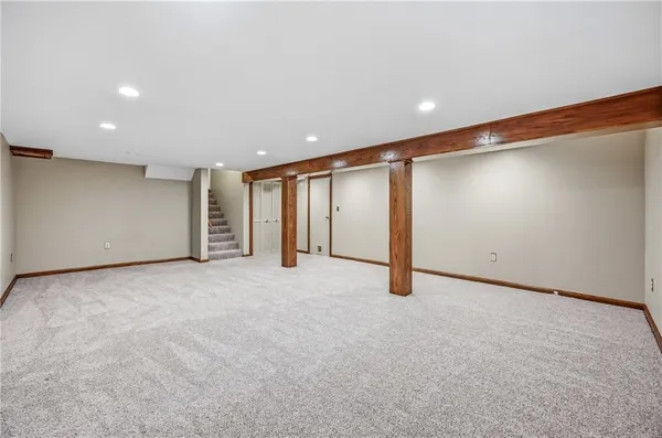 a view of an empty room and cabinet