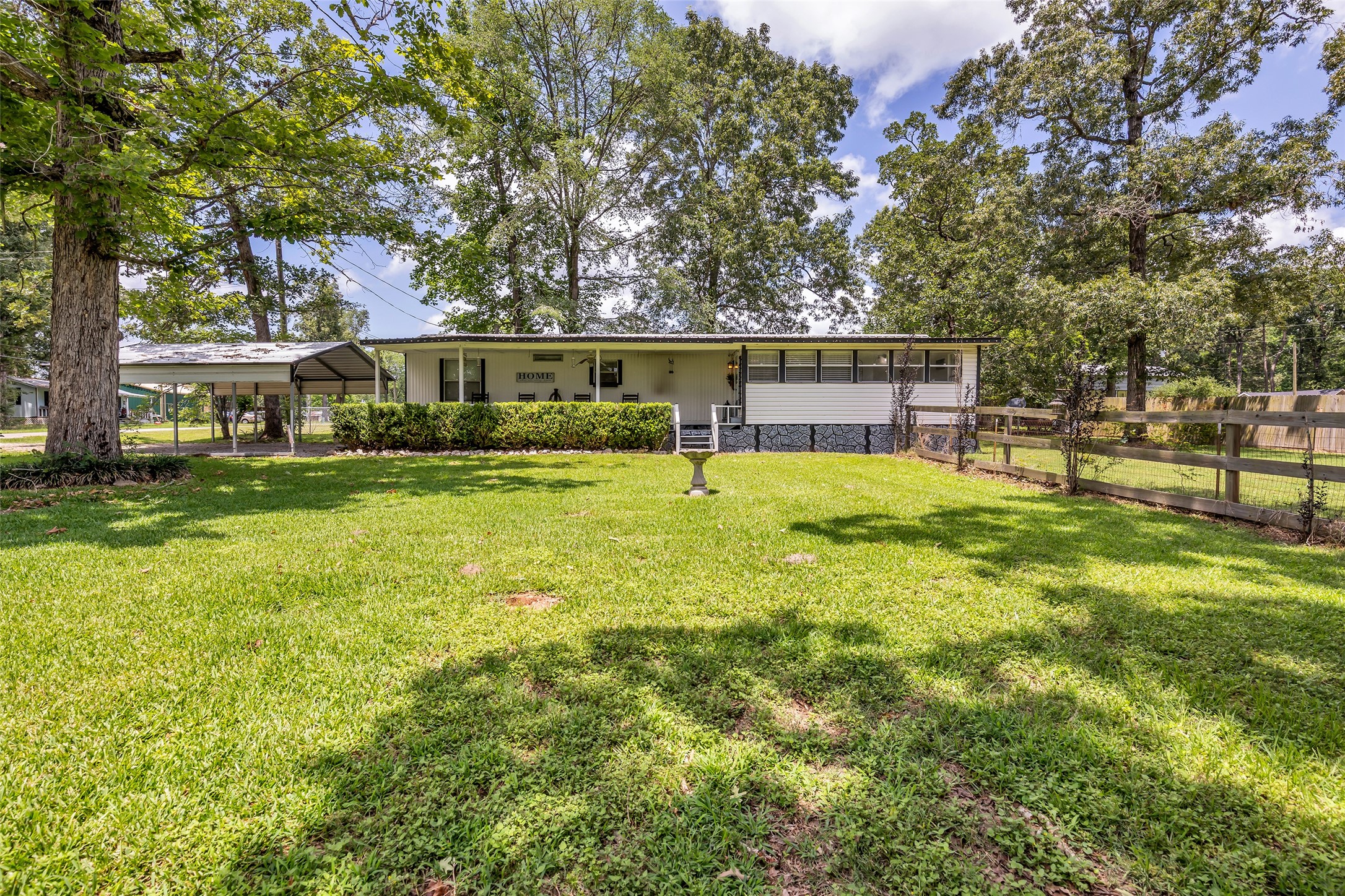 188 Chrissy Lane Trinity, TX 75862 - Photo 24 of 25 a view of swimming pool with lawn chairs and plants