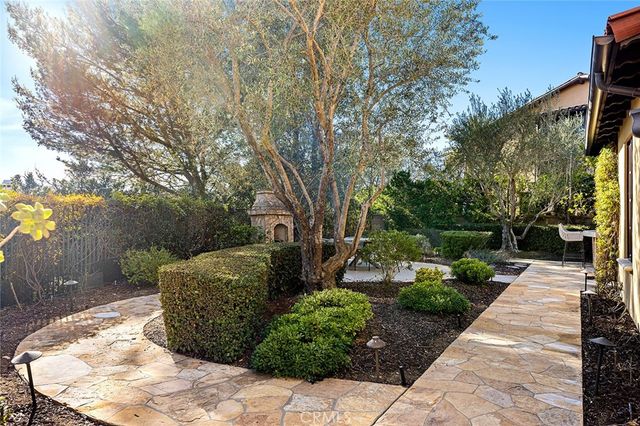 a view of a chairs and table in the patio