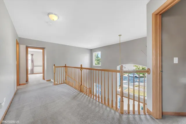 a bathroom with a double vanity sink toilet mirror and bathtub