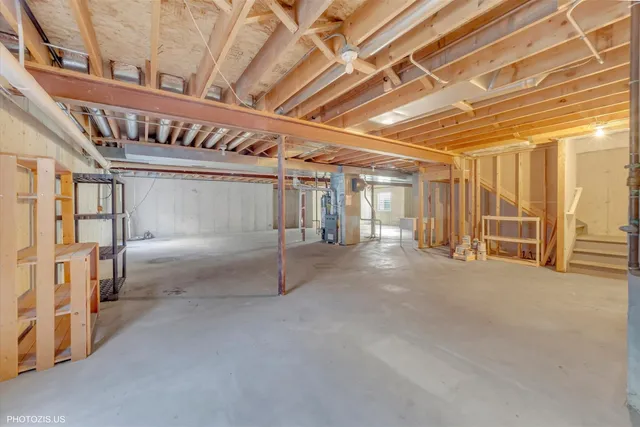 a view of a chair and table in the garden
