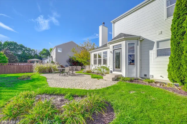 a view of a house with a big yard