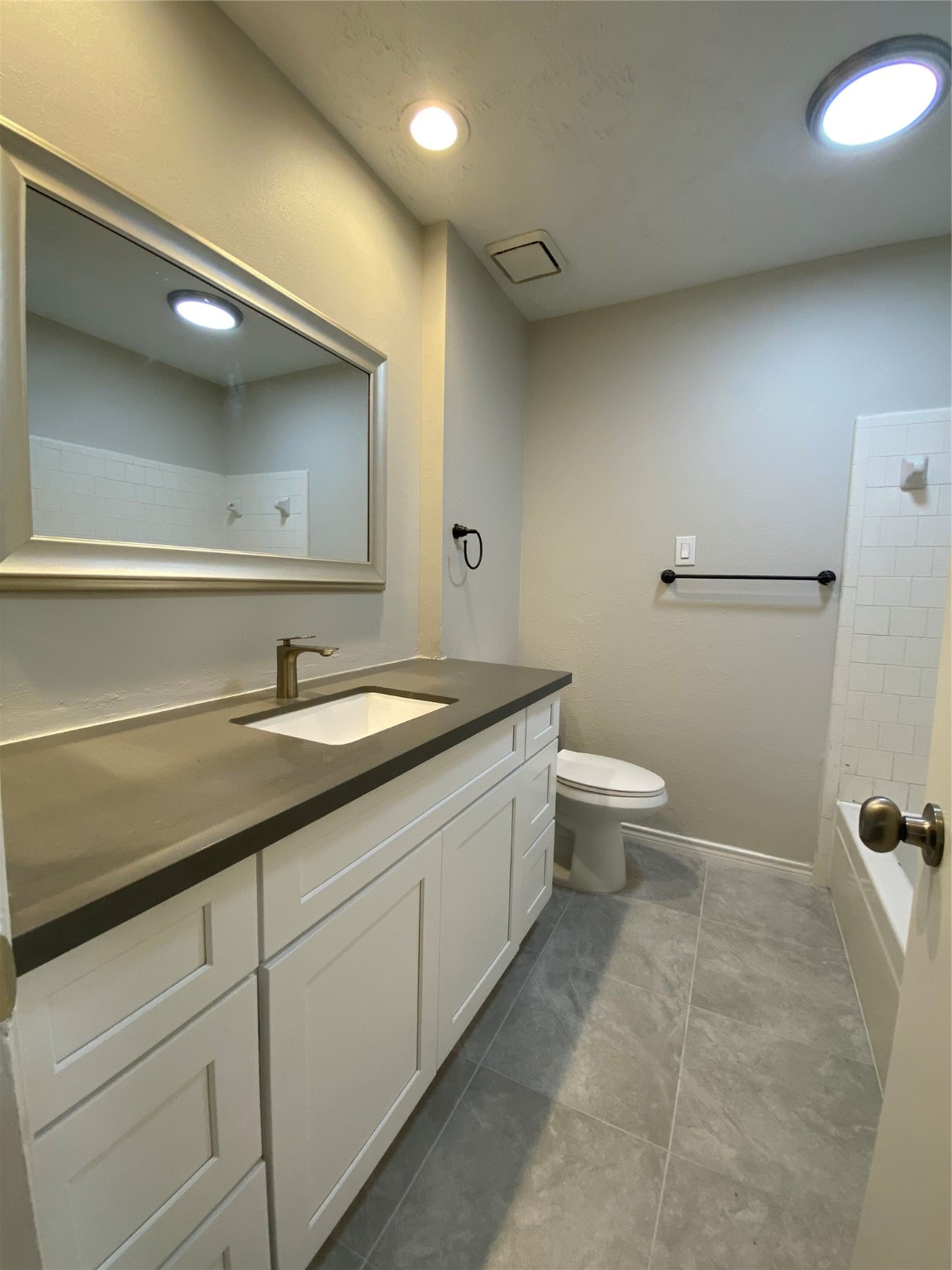 4806 Temple Bell Drive Spring, TX 77388 - Photo 12 of 15 a bathroom with a double vanity sink toilet and a mirror