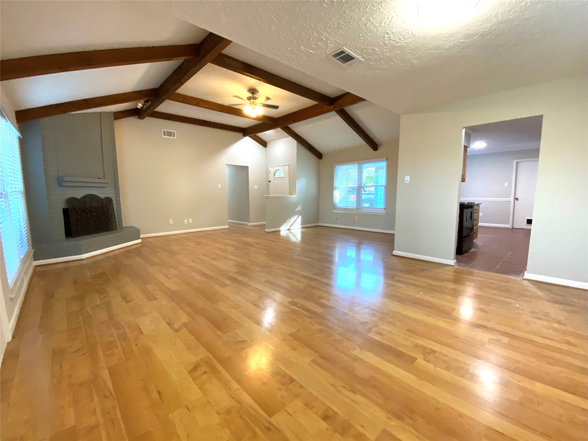 4806 Temple Bell Drive Spring, TX 77388 - Photo 3 of 15 a view of a big room with wooden floor and windows