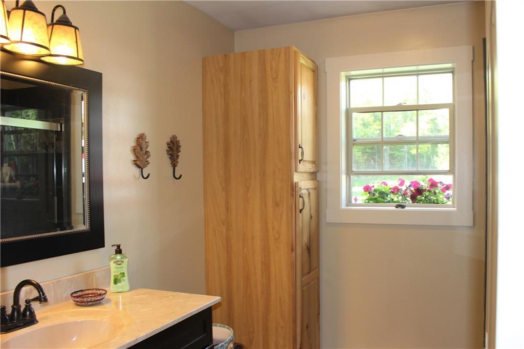 562 Springy Pond Road Ellsworth, ME 04605 - Photo 24 of 33 Master bath has stone and tile shower.