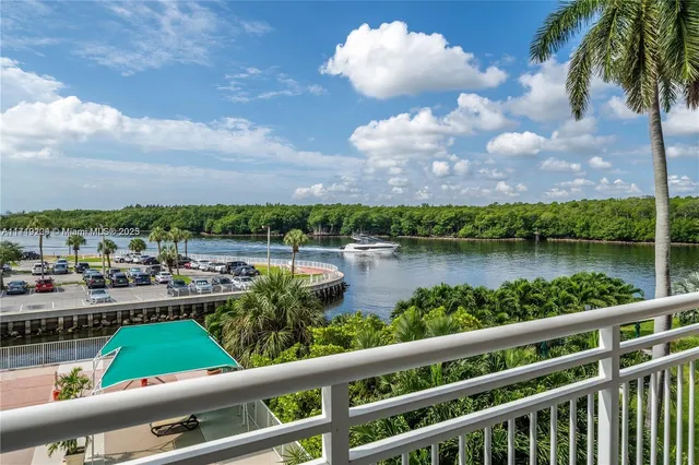 a view of a lake from a balcony