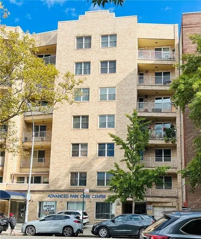 a view of a building with a street