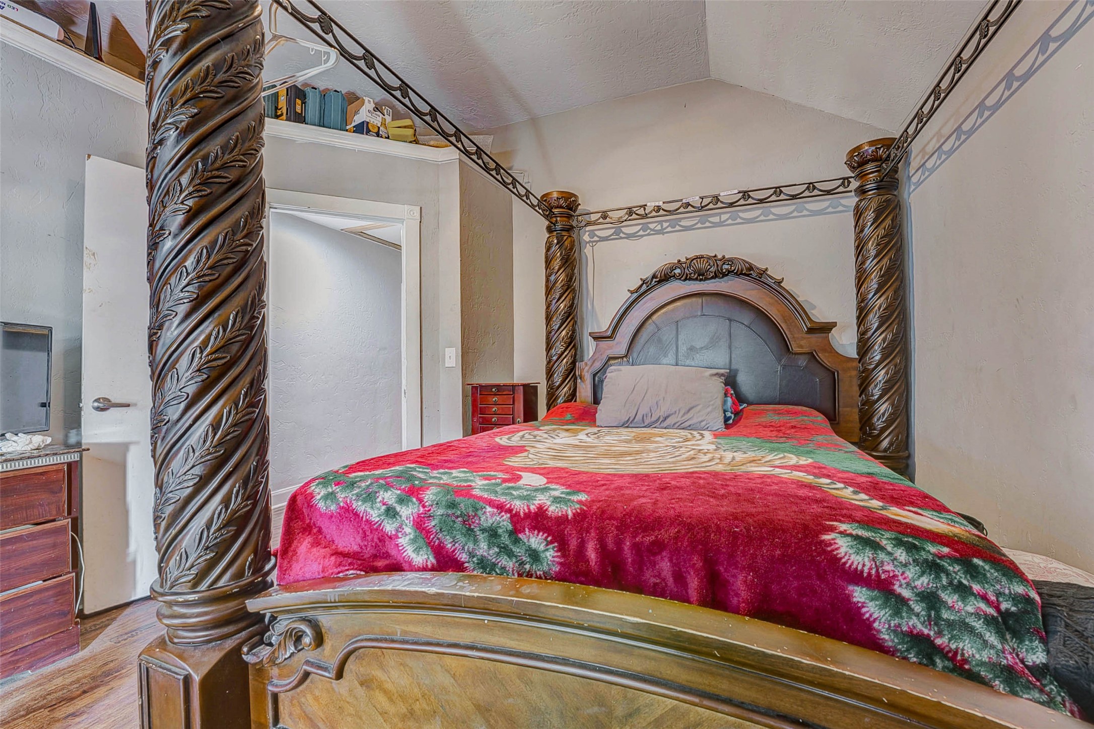 3623 Inez Street Fresno, TX 77545 - Photo 17 of 33 a bedroom with a bed and a mirror