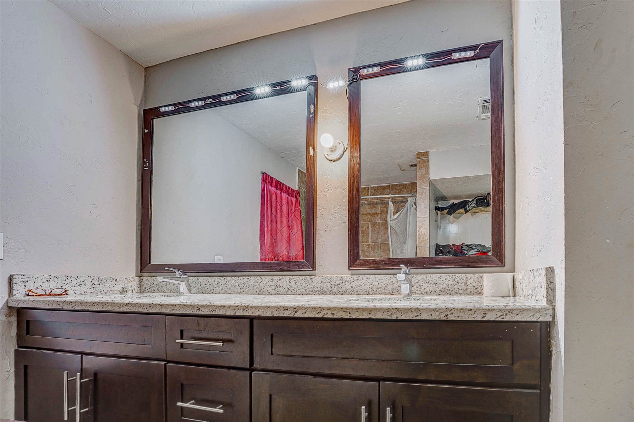 3623 Inez Street Fresno, TX 77545 - Photo 21 of 33 a bathroom with a sink and a mirror