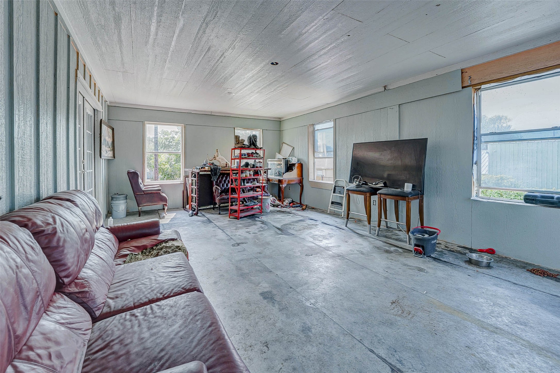 3623 Inez Street Fresno, TX 77545 - Photo 23 of 33 a living room with furniture and a flat screen tv