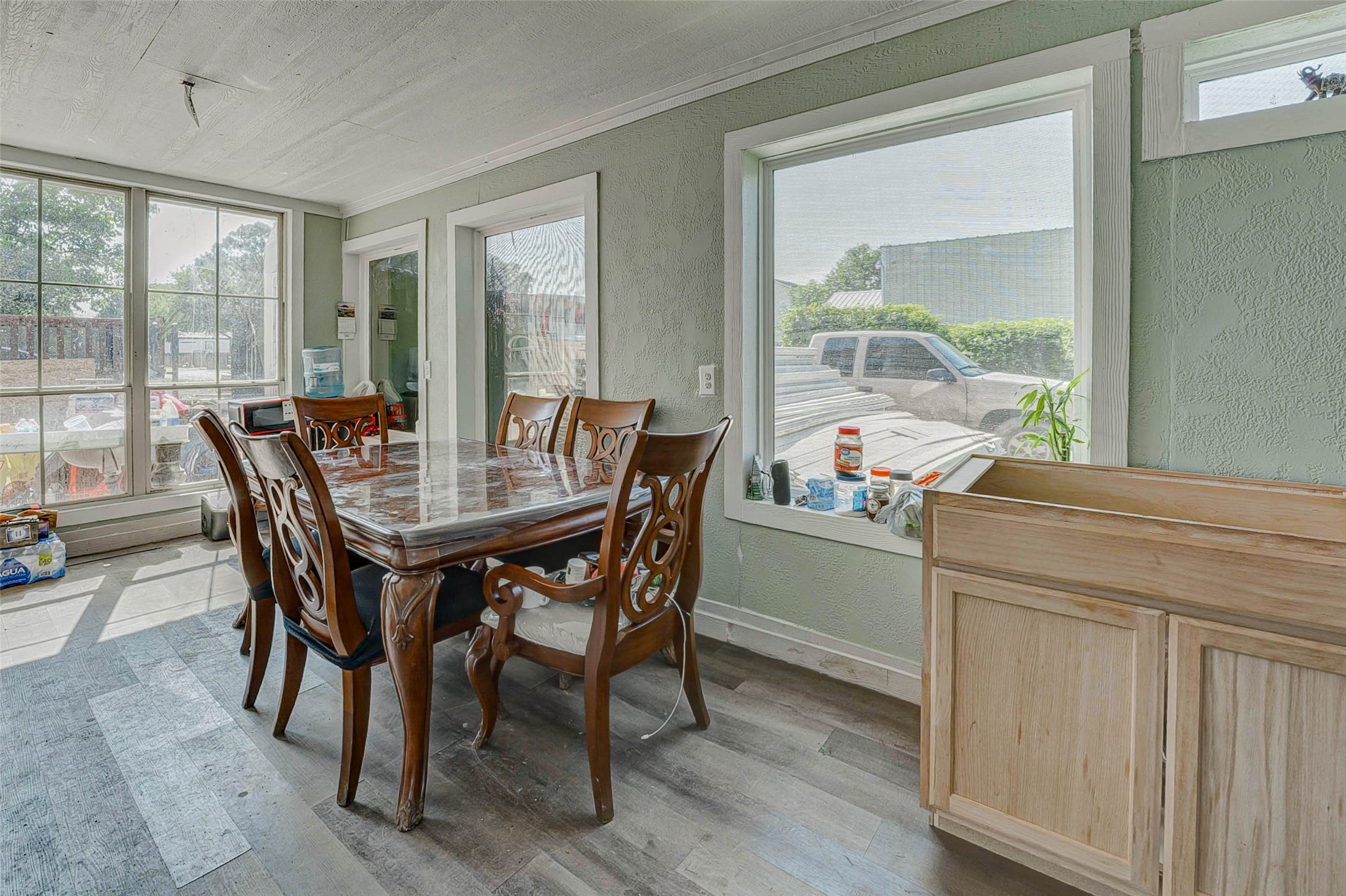 3623 Inez Street Fresno, TX 77545 - Photo 24 of 33 a dining room with furniture window wooden floor