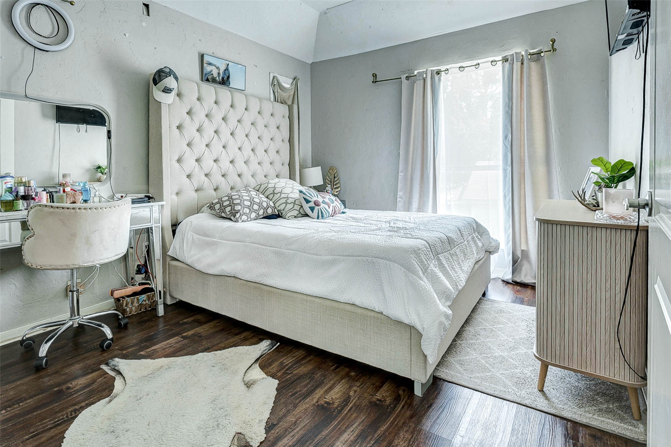 3623 Inez Street Fresno, TX 77545 - Photo 3 of 33 a bedroom with a bed and a table in it