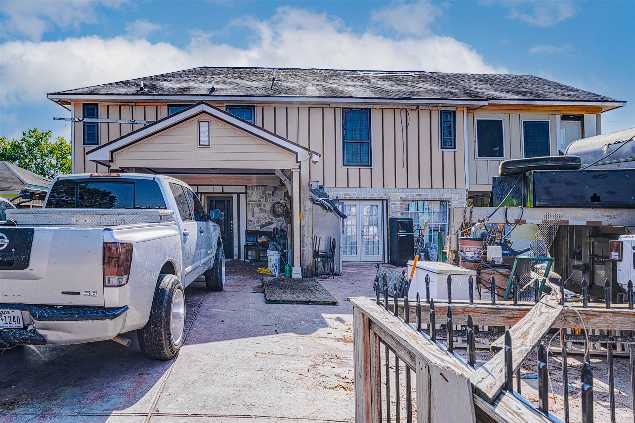 3623 Inez Street Fresno, TX 77545 - Photo 31 of 33 a front view of a house with barbeque grill and furniture