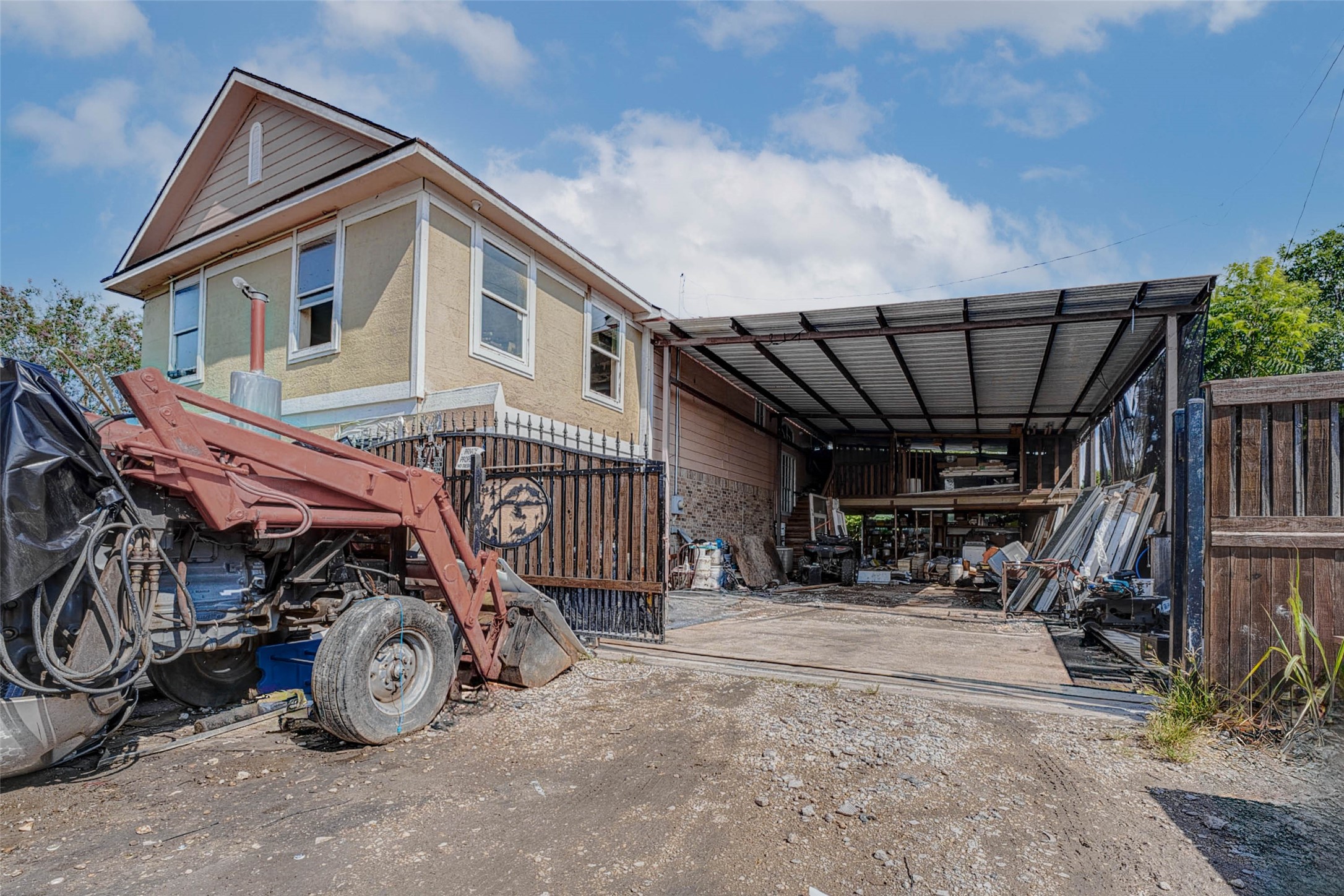 3623 Inez Street Fresno, TX 77545 - Photo 32 of 33 a view of garage with a car parked under an umbrella