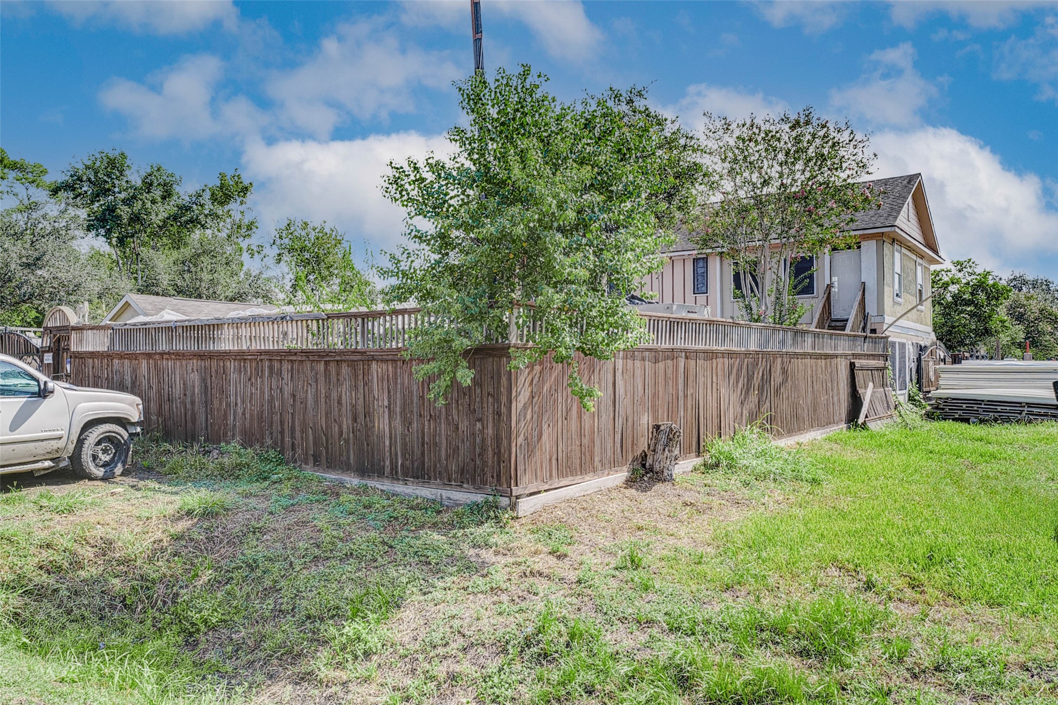3623 Inez Street Fresno, TX 77545 - Photo 33 of 33 a view of a backyard with wooden fence