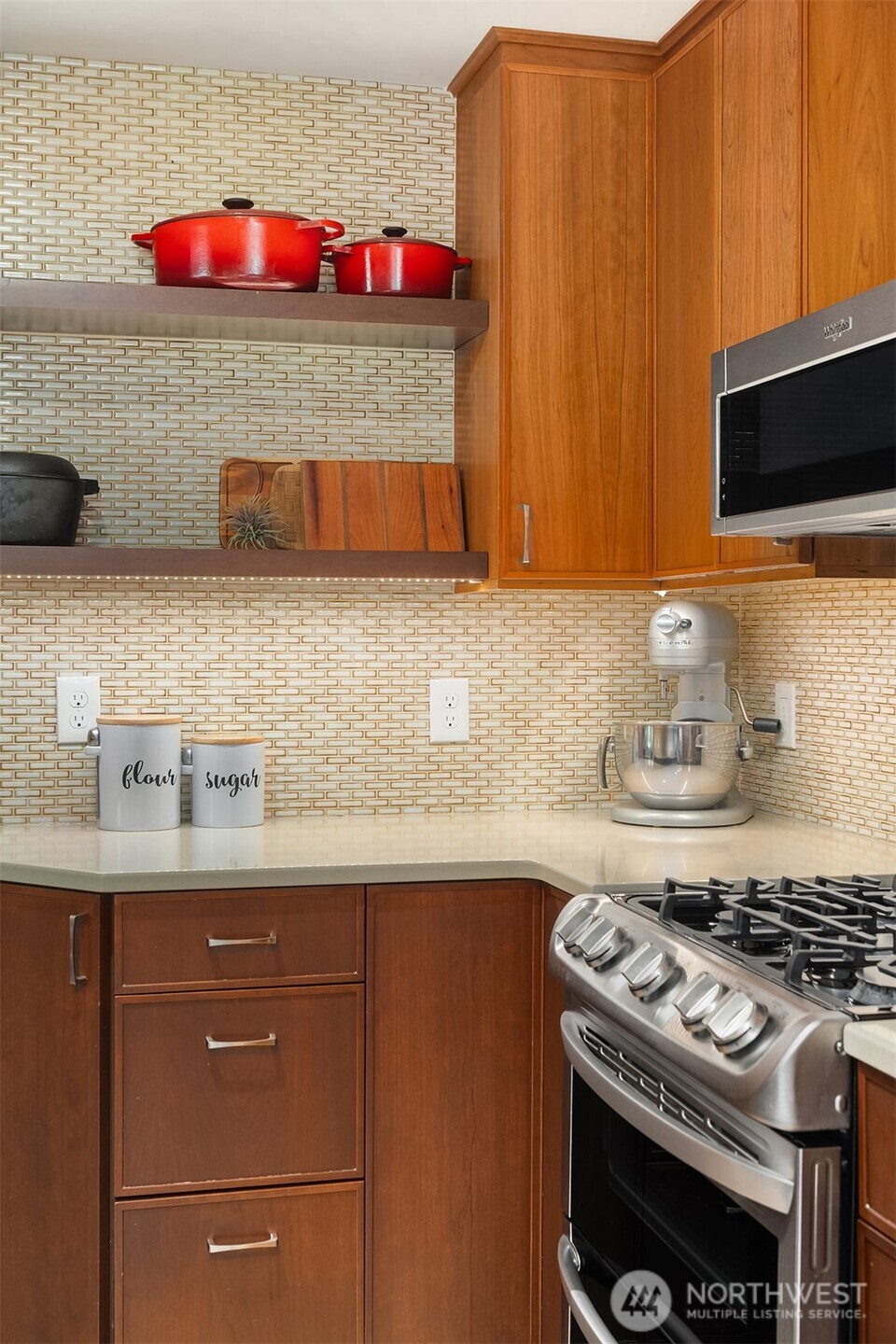 6034 40th Avenue Northeast Seattle, WA 98115 - Photo 11 of 40 a kitchen with a stove and a sink