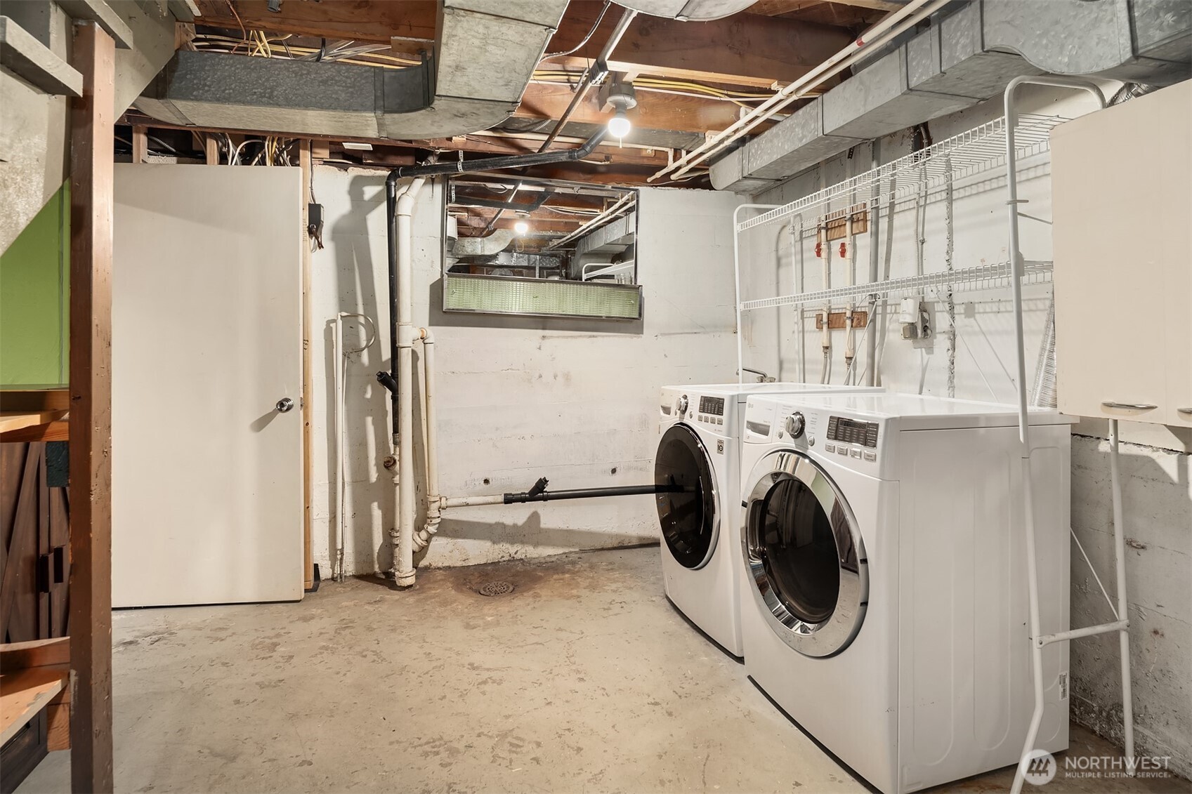 6034 40th Avenue Northeast Seattle, WA 98115 - Photo 22 of 40 a utility room with dryer and washer