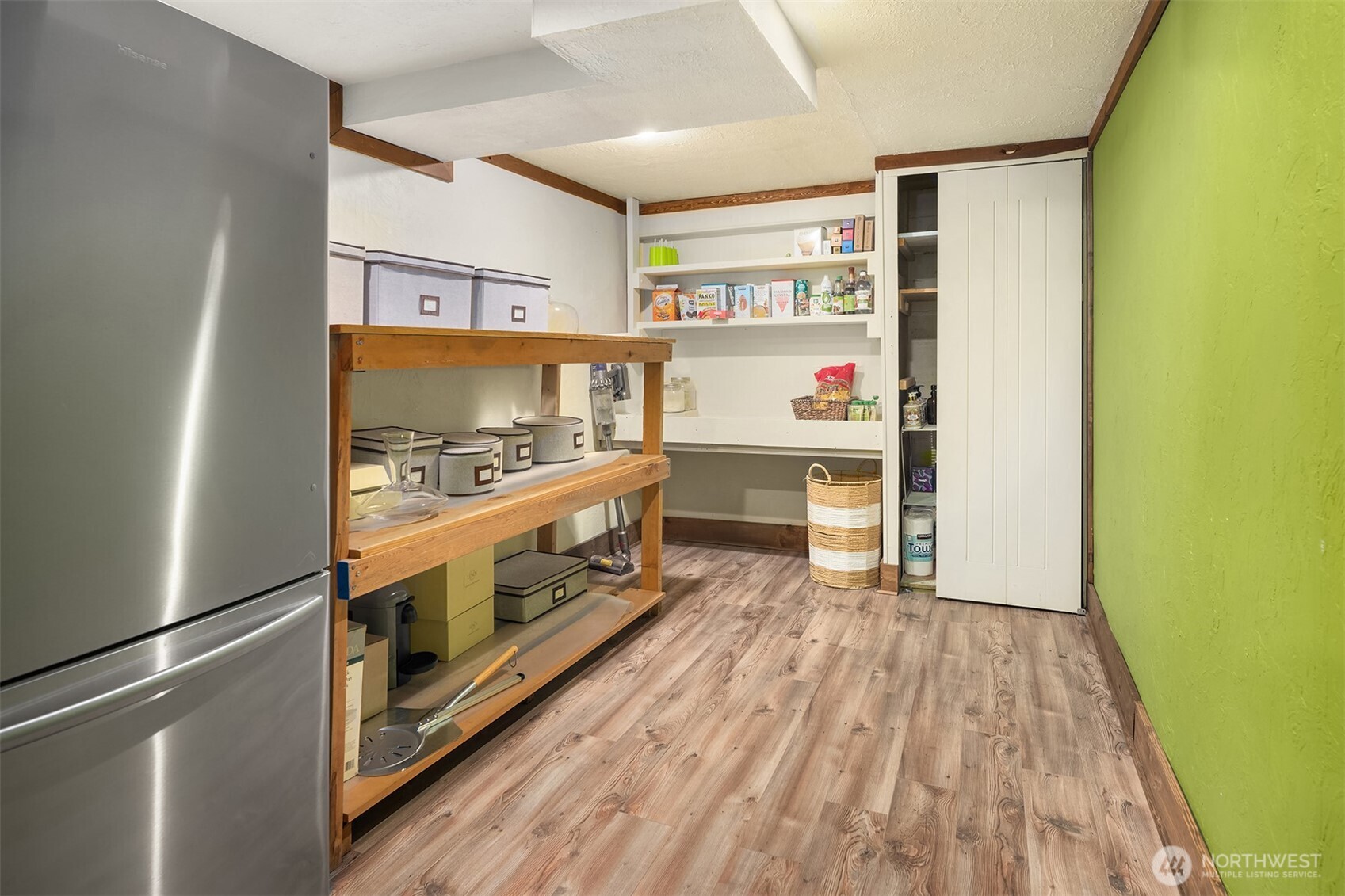 6034 40th Avenue Northeast Seattle, WA 98115 - Photo 23 of 40 a kitchen with stainless steel appliances a stove and a refrigerator