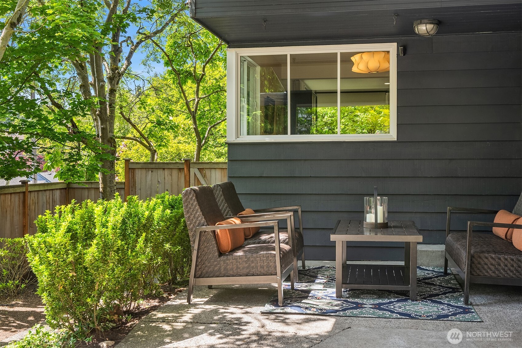 6034 40th Avenue Northeast Seattle, WA 98115 - Photo 24 of 40 a backyard of a house with outdoor seating