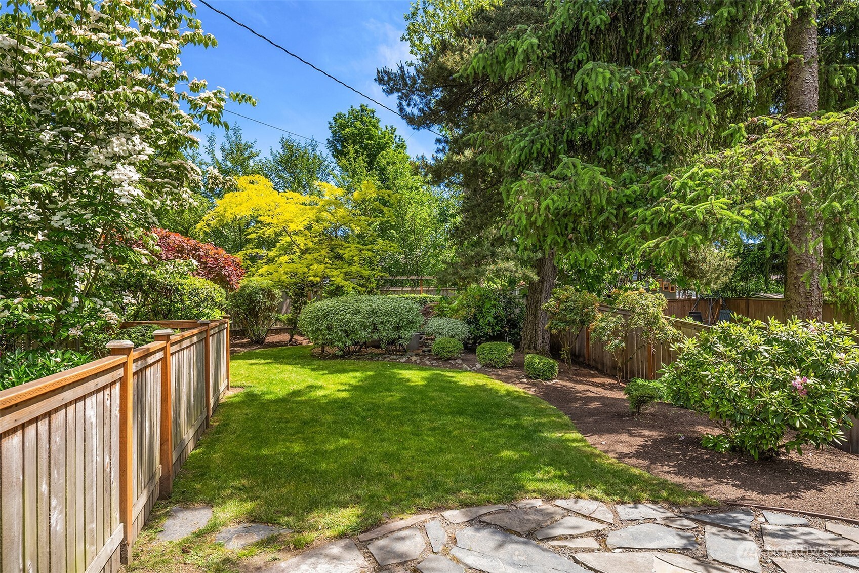6034 40th Avenue Northeast Seattle, WA 98115 - Photo 25 of 40 a view of a backyard with pathway