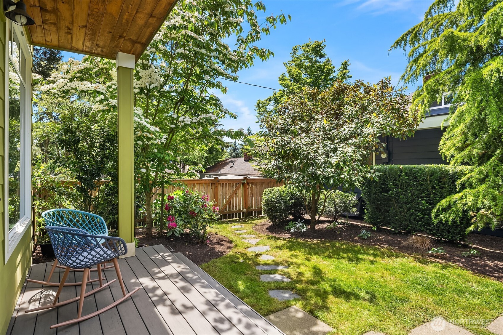 6034 40th Avenue Northeast Seattle, WA 98115 - Photo 31 of 40 a backyard of a house with yard and outdoor seating