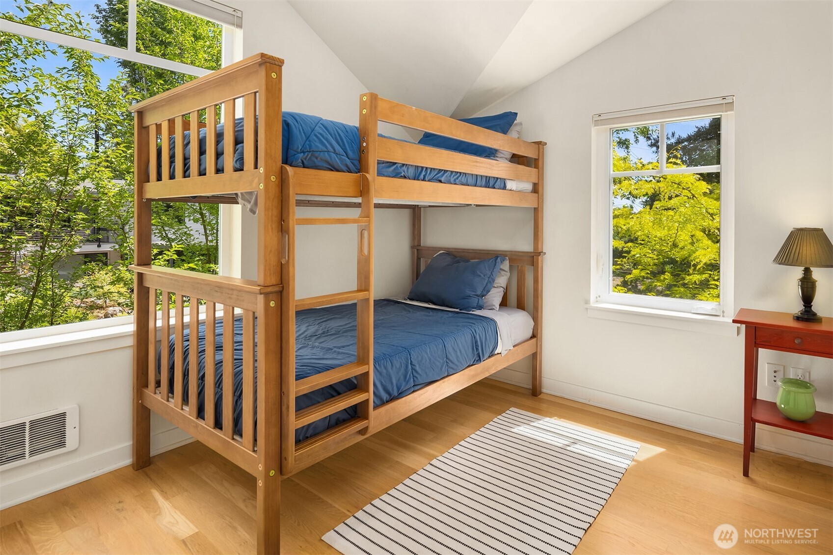 6034 40th Avenue Northeast Seattle, WA 98115 - Photo 36 of 40 a bedroom with a bed and a window