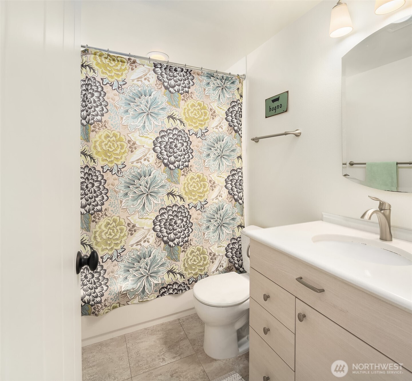6034 40th Avenue Northeast Seattle, WA 98115 - Photo 37 of 40 a bathroom with a granite countertop sink and a toilet