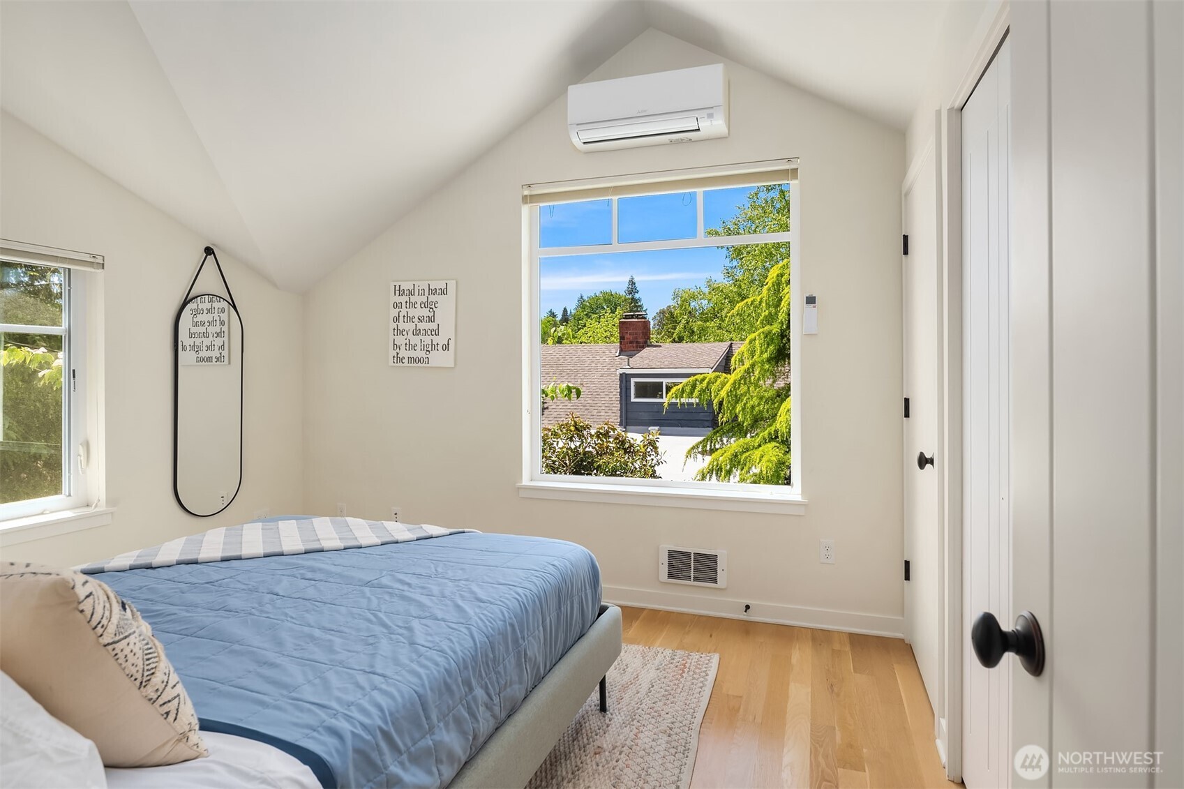 6034 40th Avenue Northeast Seattle, WA 98115 - Photo 38 of 40 a bedroom with a bed and a window