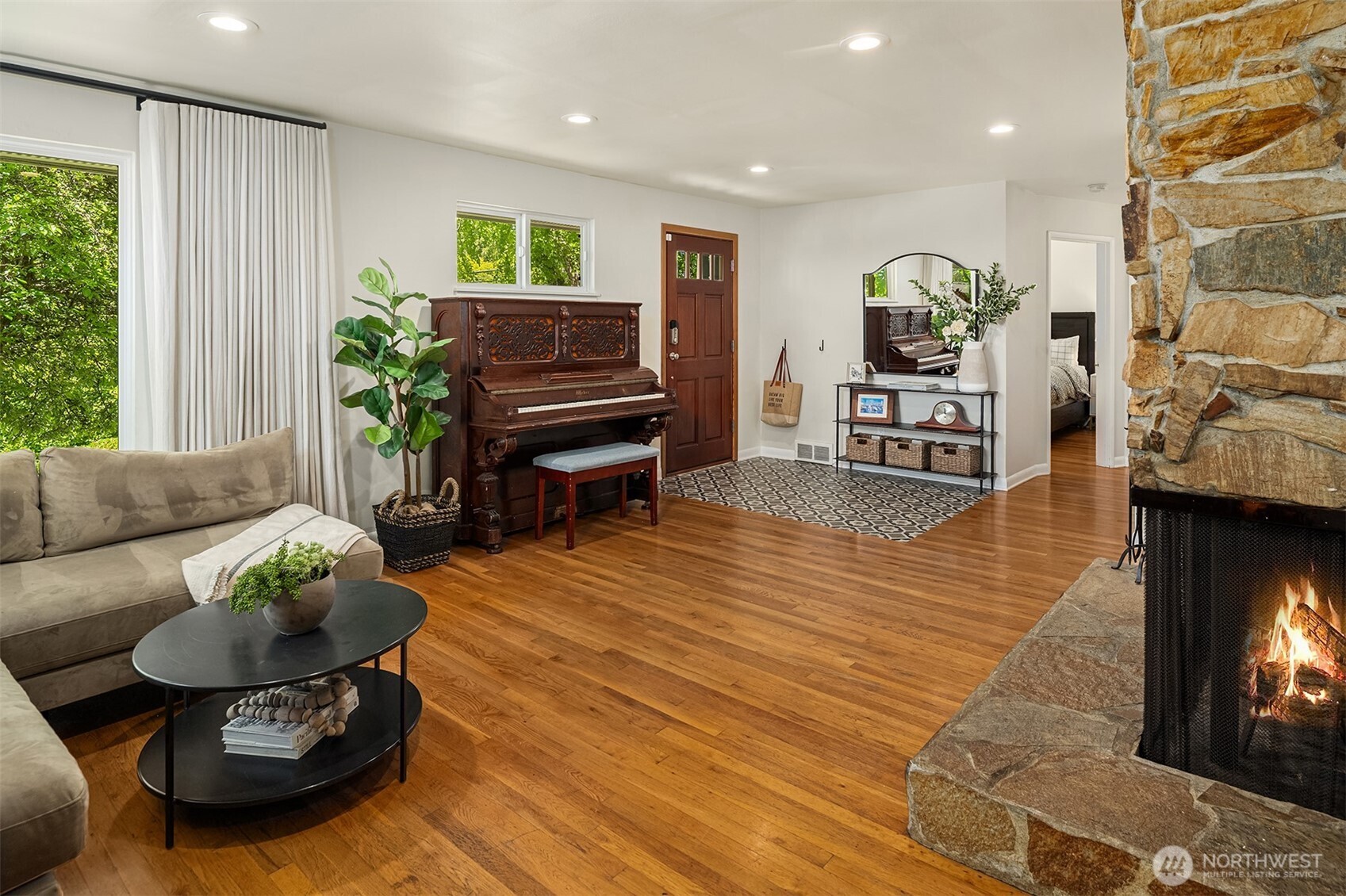 6034 40th Avenue Northeast Seattle, WA 98115 - Photo 6 of 40 a living room with furniture and a fireplace