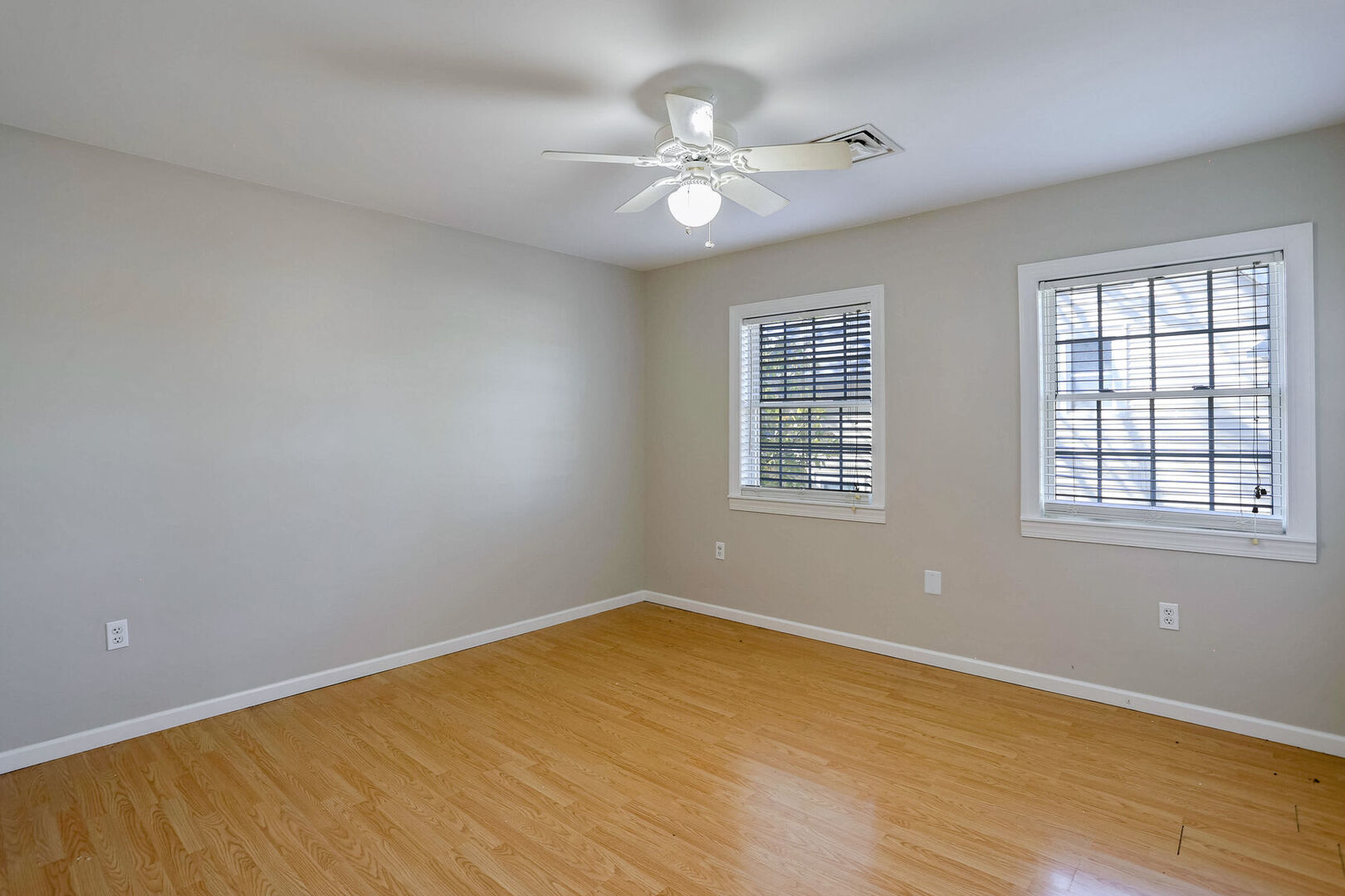 504 East Church Street Champaign, IL 61820 - Photo 30 of 55 wooden floor in an empty room with a window