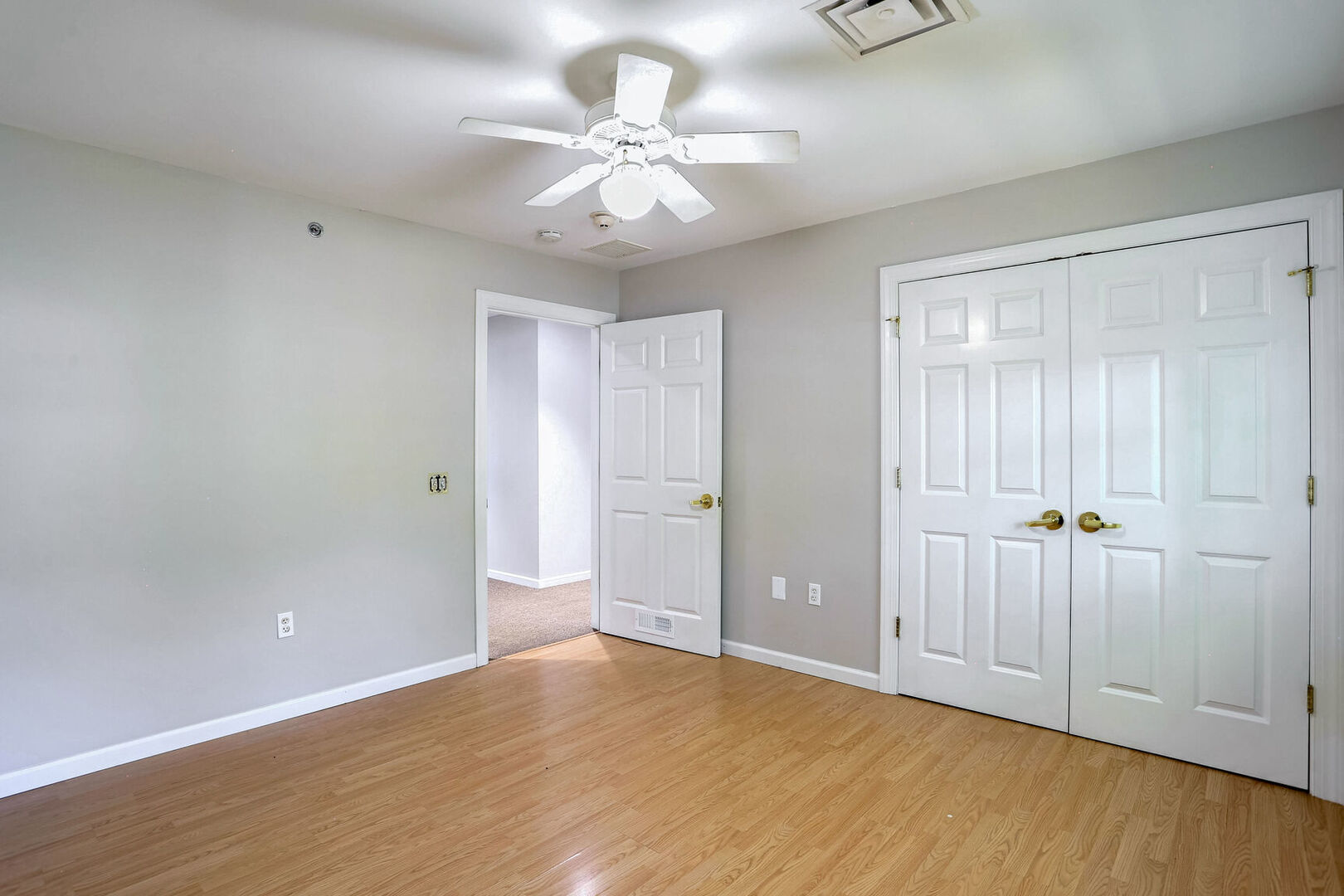 504 East Church Street Champaign, IL 61820 - Photo 35 of 55 a view of an empty room with wooden floor