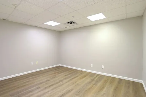 a picture of a bathroom with a shower