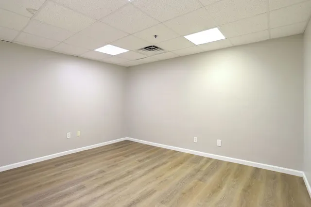 a picture of a bathroom with a shower