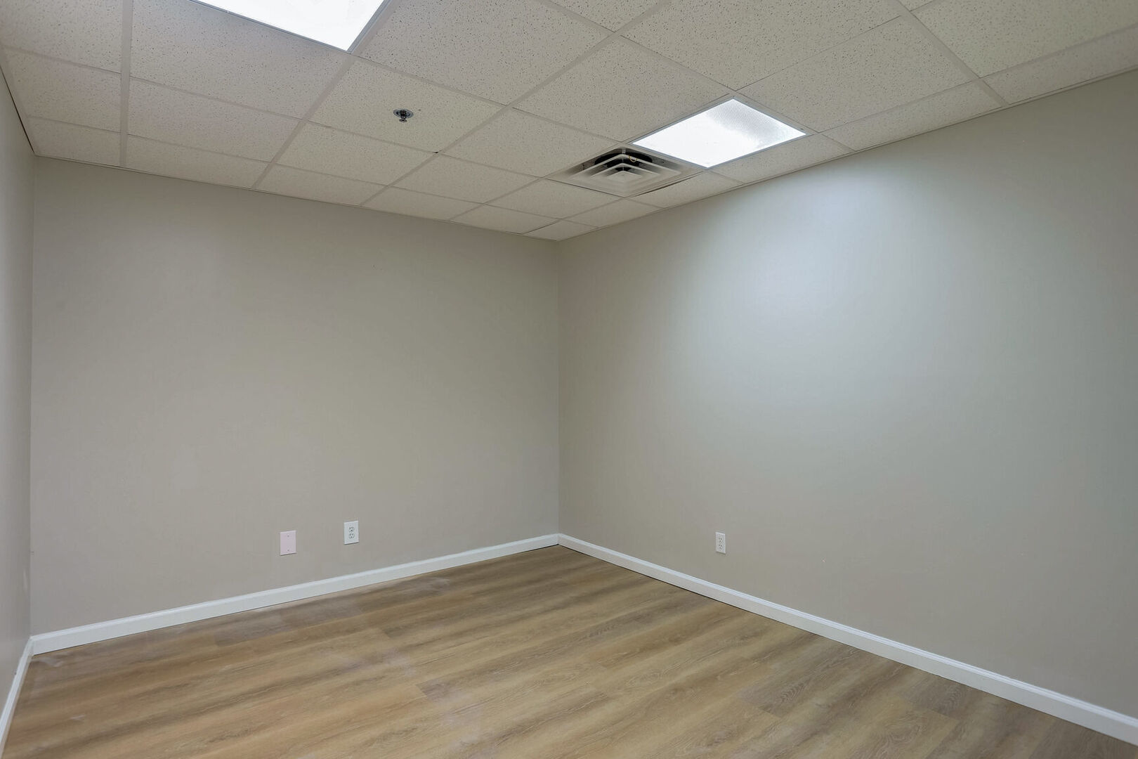 504 East Church Street Champaign, IL 61820 - Photo 49 of 55 a view of an empty room with wooden floor
