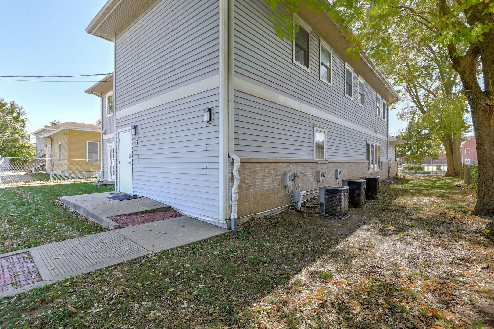 504 East Church Street Champaign, IL 61820 - Photo 50 of 55 a view of a house with backyard and sitting area