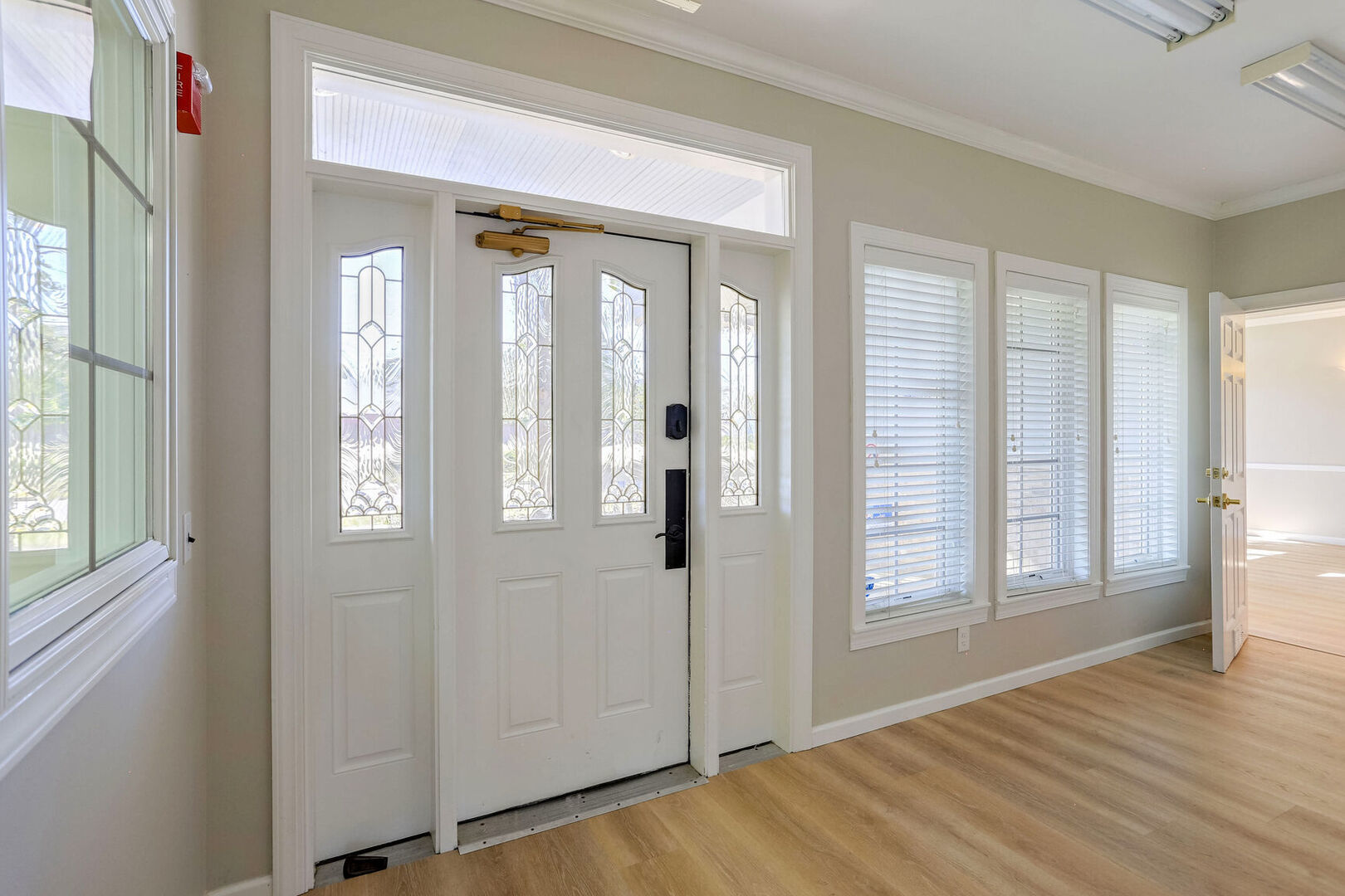 504 East Church Street Champaign, IL 61820 - Photo 6 of 55 a view of a room that has a window in it