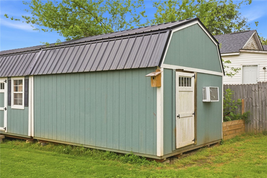 314 South Fairplay Street Seneca, SC 29678 - Photo 40 of 50 This charming utility building offers practical outdoor storage and features classic barn-style roofing.