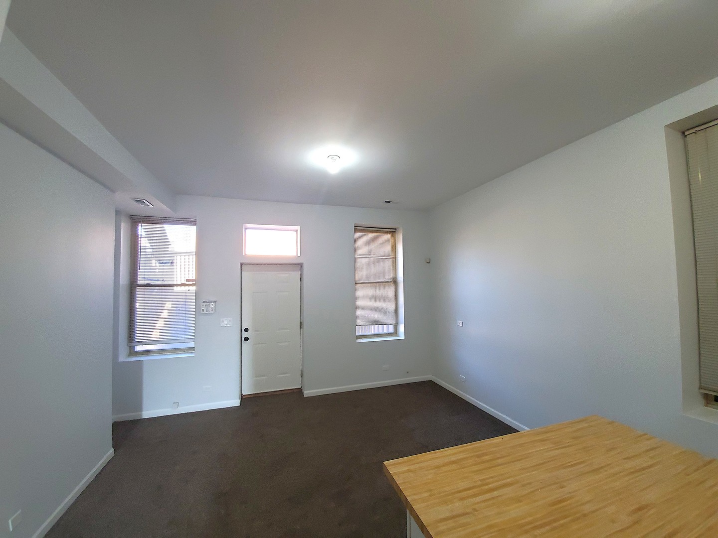 752 East 43rd Street, Unit 2E Chicago, IL 60653 - Photo 6 of 16 an empty room with windows