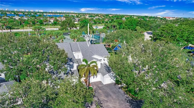 a view of a garden with a building in front of it