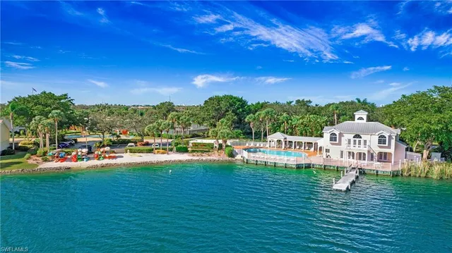 a view of a house with a yard porch and sitting area
