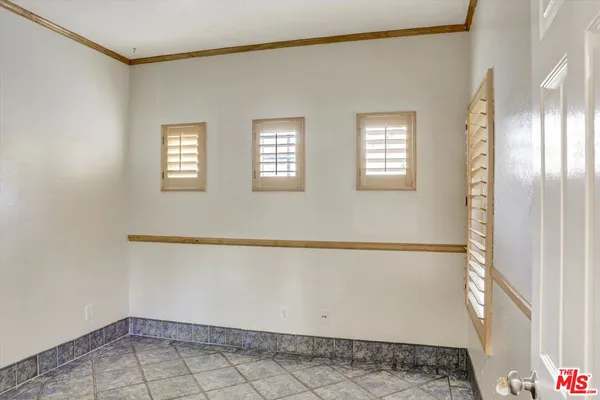 a view of a hallway with washer and dryer
