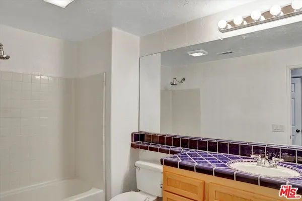 a view of a room with windows