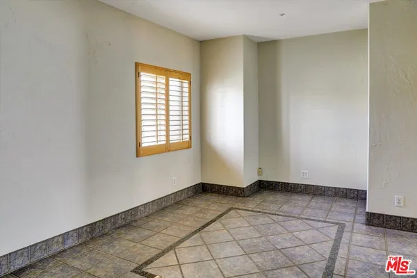 a view of an empty room with window