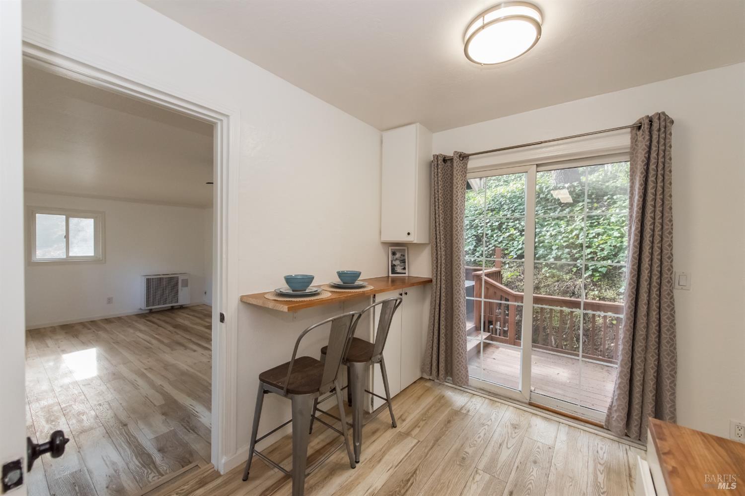 8650 Mirabel Road Forestville, CA 95436 - Photo 6 of 42 a workspace with wooden floor and a window